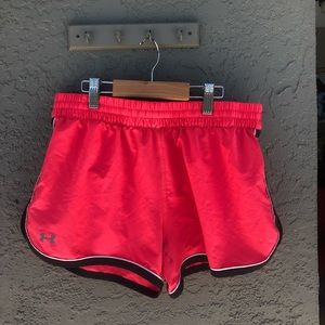 UnderArmour running shorts.